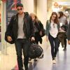 Robert Pattinson et Kristen Stewart arrivant à l'aéroport de Los Angeles le 26 Novembre 2012.