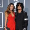 Nikki Sixx et Courtney Bingham aux 53e Grammy Awards en février 2011. Ils se sont fiancés en novembre 2012, lors d'un voyage de Thanksgiving à Saint-Barthélemy.