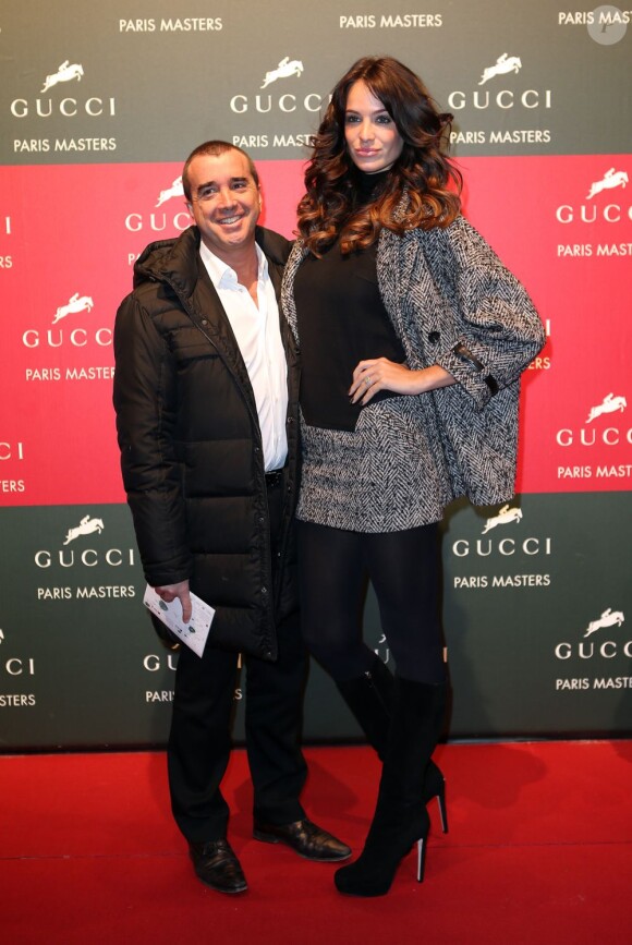 Jade Foret, superbe, et Arnaud Lagardère aux Gucci Masters à Villepinte, le 2 décembre 2012