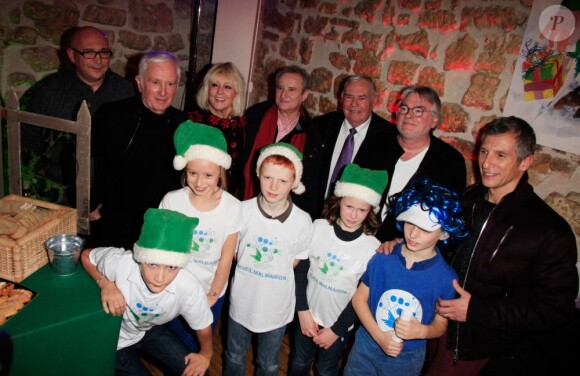 Nagui assiste à la soirée de lancement de l'opération les Pères Noel Verts à Paris le 3 décembre 2012.