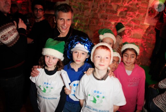 Nagui assiste à la soirée de lancement de l'opération les Pères Noel Verts à Paris le 3 décembre 2012.