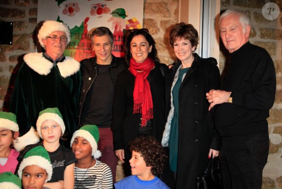 Nagui, Catherine Laborde et Marcel Amont assistent à la soirée de lancement de l'opération les Pères Noel Verts à Paris le 3 décembre 2012.