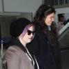 Kelly Osbourne et son chéri Matthew Mosshart arrivent à l'aéroport de Los Angeles, le 23 decembre 2012.