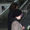 Kelly Osbourne et son petit ami Matthew Mosshart débarquent à l'aéroport de Los Angeles, le 23 decembre 2012.