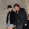 Johnny Hallyday et sa femme Laeticia sortent du Grand Palais à Paris, le 9 novembre 2012.
