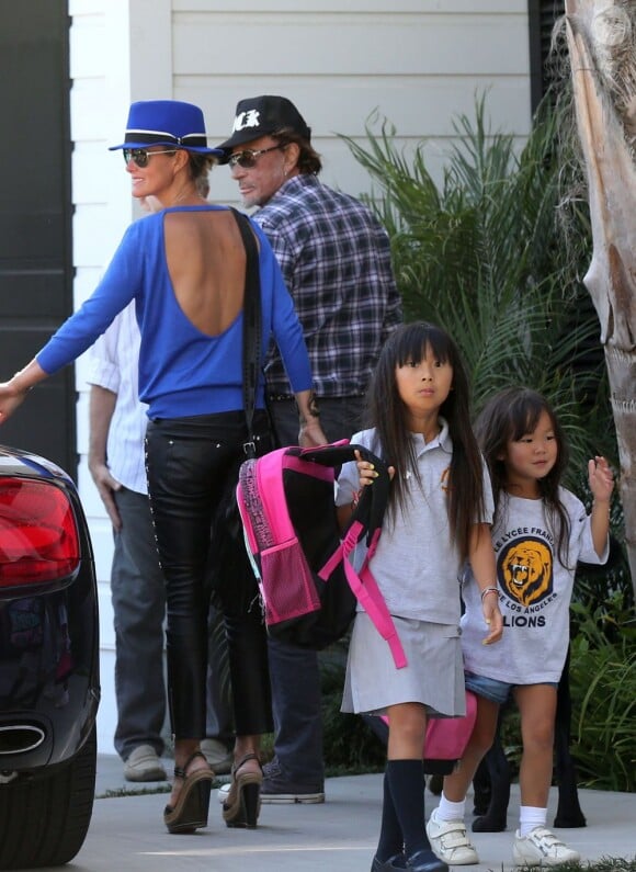 Johnny Hallyday avec sa femme Laeticia et ses filles Jade et Joy à Los Angeles le 7 septembre 2012.
