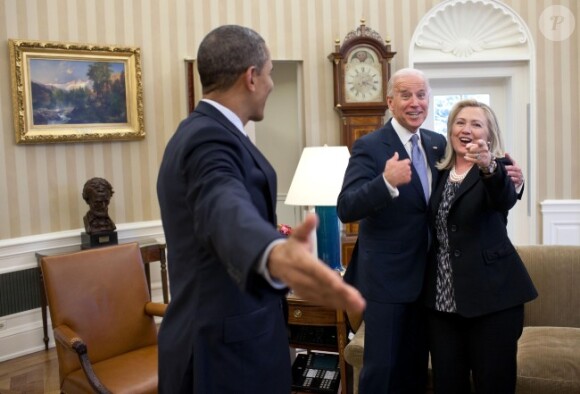 Hillary Clinton en compagnie de Barack Obama et de Joe Biden à Washington, le 30 janvier 2012.