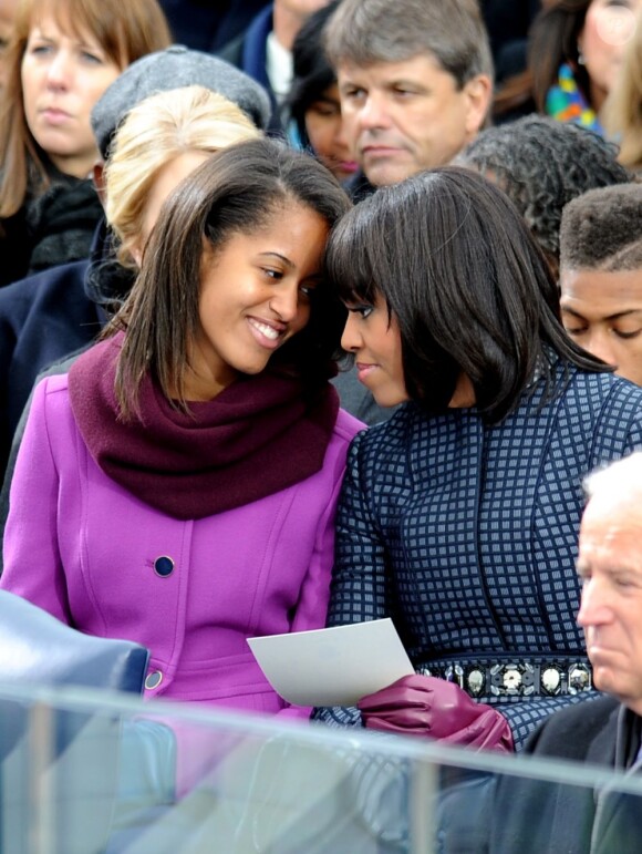 Sasha et Malia Obama, complices avec leur maman Michelle, ont été remarquées par leurs looks le 21 janvier 2013 à la cérémonie d'investiture de leur papa Barack Obama à Washington
