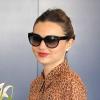 Miranda Kerr arrive à l'aéroport de Los Angeles avec son mari Orlando Bloom et leur fils Flynn. Le 22 janvier 2013.