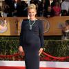 Busy Philipps portait une robe très moulante à la 19e cérémonie des Screen Actors Guild Awards à Los Angeles, le 27 janvier 2013.