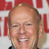 Bruce Willis tout sourire à la première de Die Hard : Belle journée pour mourir à Berlin, le 4 février 2013.