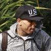 Chris Brown quitte son domicile et se dirige vers le tribunal du comté de Los Angeles où il doit comparaître avec son avocat Mark Geragos. Los Angeles, le 6 février 2013.