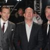 Jai Courtney, Bruce Willis et Sebastian Koch pendant l'avant-première du film Die Hard : Belle journée pour mourir à Londres, le 7 février 2013.