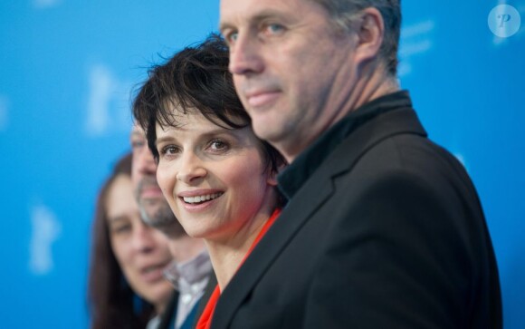 Juliette Binoche au côté de Bruno Dumont lors du photocall du film Camille Claudel 1915 à la 63e Berlinale, le 12 février 2013.