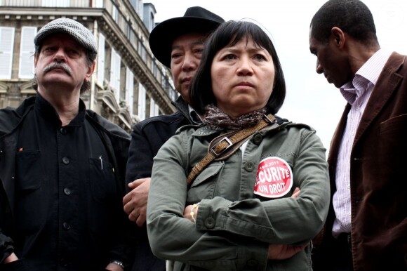Anh Dao Traxel dans le quartier de Belleville où elle dénonce les violences que subit la communauté asiatique, à Paris le 19 juin 2011.