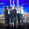 Laurence Ferrari, Roselyne Bachelot, Audrey Pulvar, Elisabeth Bost et Hapsatou Sy et Cyril Hanouna déguisées en homme sur le plateau du Grand 8, jeudi 7 mars 2013