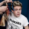 Niall Horan des One Direction se fait mesurer pour entrer chez Madame Tussauds, le 11 mars 2013.