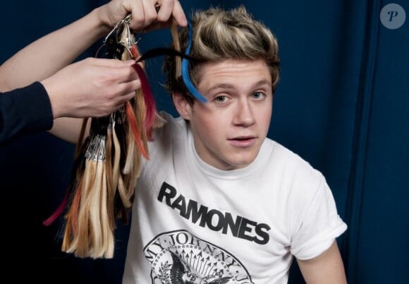 Niall Horan des One Direction se fait mesurer pour entrer chez Madame Tussauds, le 11 mars 2013.