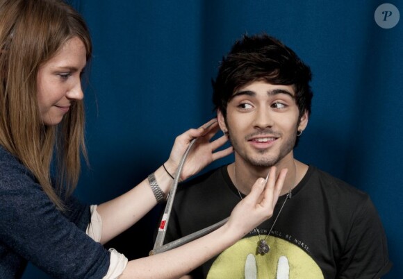 Zayn Malik des One Direction se fait mesurer pour entrer chez Madame Tussauds, le 11 mars 2013.