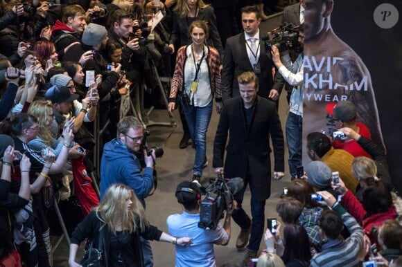 David Beckham au milieu de ses fans lors d'un événement pour faire la promotion de ses sous-vêtements H&M à Berlin le 19 mars 2013