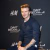 David Beckham prend la pose lors d'un événement pour faire la promotion de ses sous-vêtements H&M à Berlin le 19 mars 2013