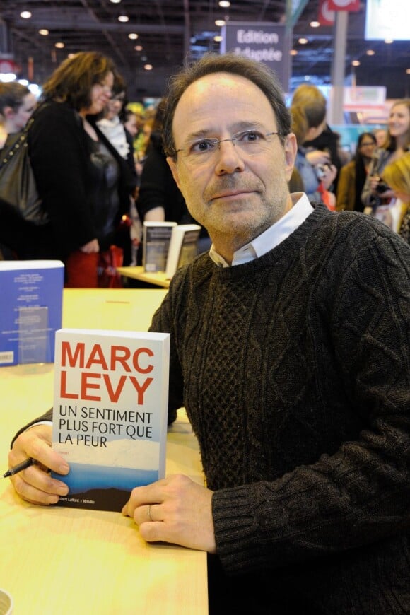 Marc Lévy au salon du livre 2013 au Parc des Expositions, à Paris, le 23 mars 2013