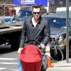 Brian Austin Green emmène son bébé, Noah, en virée shopping dans un magasin Adidas, le 29 mars 2013 à New York.