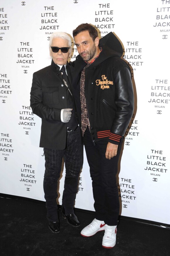 Karl Lagerfeld et Riccardo Tisci assistent à la soirée privée consacrée à l'exposition The Little Black Jacket à Milan. Le 4 avril 2013.