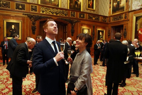 Damian Lewis et sa femme Helen McCrory à l'occasion d'une cérémonie célébrant le cinéma britannique, au château de Windsor à Londres, le 4 avril 2013. 