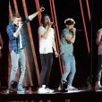 One Direction sur scène à Londres, le 6 avril 2013. Le chanteur a terminé en boxer à cause d'une blague de Liam Payne.