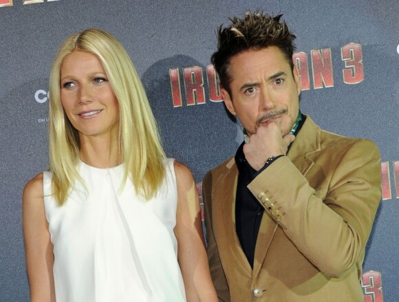 Gwyneth Paltrow et Robert Downey Jr. posent au photocall du film Iron Man 3 au palais Montgelais à Munich, le 12 avril 2013.