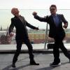 Ben Kingsley frappé par Robert Downey Jr. lors du photocall d'Iron Man 3 au Ritz Carlton Hotel, Moscou, le 10 avril 2013.