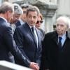 Bertrand Delanoe et Nicolas Sarkozy lors des obsèques d'Antoine Veil au cimetière du Montparnasse à Paris le 15 avril 2013.