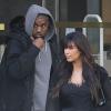 Kim Kardashian enceinte et Kanye West font du shopping dans la boutique 'Bonpoint' à Paris le 1er avril 2013.