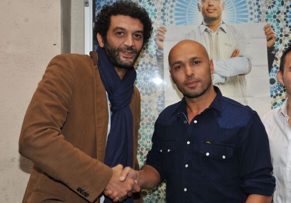 Eric Judor et Ramzy Bédia complices à la première du film Mohamed Dubois au Gaumont Opéra, Paris, le 16 avril 2013.