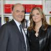 Pierre Moscovici et sa compagne Marie-Charline Pacquot à Paris le 24 mars 2013.