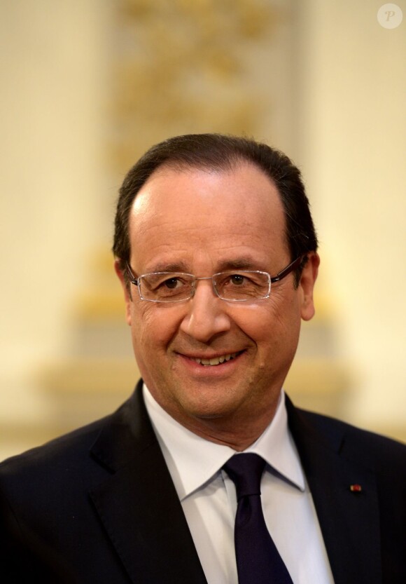 Francois Hollande lors d'une cérémonie traditionnelle de remise du muguet à l'Elysée, le 1er mai 2013.