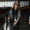 Jessica Alba arrive à l'aéroport LAX de Los Angeles pour prendre un avion. Le 30 avril 2013