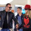 Christian Audigier et sa fiancée Nathalie Sorensen à l'aéroport de Los Angeles pour prendre un vol en direction de Paris, le 5 mai 2013