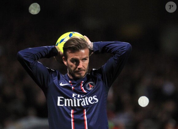 L'équipe du PSG a célébré son titre de champion de France acquis après sa victoire 1-0 sur la pelouse de l'Olympique Lyonnais, le 12 mai 2013 à Lyon