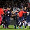 L'équipe du PSG a célébré son titre de champion de France acquis après sa victoire 1-0 sur la pelouse de l'Olympique Lyonnais, le 12 mai 2013 à Lyon