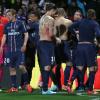 L'équipe du PSG a célébré son titre de champion de France acquis après sa victoire 1-0 sur la pelouse de l'Olympique Lyonnais, le 12 mai 2013 à Lyon