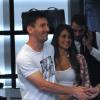 Lionel Messi et sa jolie compagne Antonella Roccuzzo font du shopping dans une boutique Dolce & Gabbana à Milan, le 14 mai 2013.
