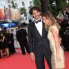 Tomer Sisley et Agathe de la Fontaine à la montée des marches du film Inside Llewyn Davis lors du 66e festival du film de Cannes, le 19 mai 2013.