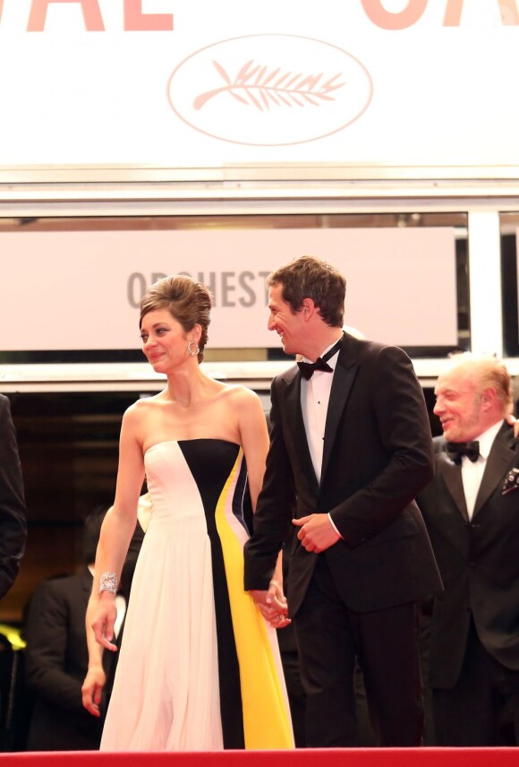 Marion Cotillard et Guillaume Canet pour la descente des marches du film Blood Ties lors du 66e Festival du film de Cannes, le 20 mai 2013.