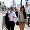 Eric Besson et sa femme Yasmine se promenant sur la Croisette en plein Festival de Cannes le 23 mai 2013