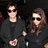 Kim Kardashian et sa mère Kris Jenner de retour à Los Angeles après leur escale à Paris. Le 23 mai 2013.