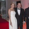 La princesse Charlene et le prince Albert de Monaco arrivant au Sporting de Monte-Carlo pour la soirée de gala du Grand Prix de Monaco, le 26 mai 2013, dont le vainqueur de la course, Nico Rosberg, était l'invité d'honneur, avec sa compagne Vivian Sibold.