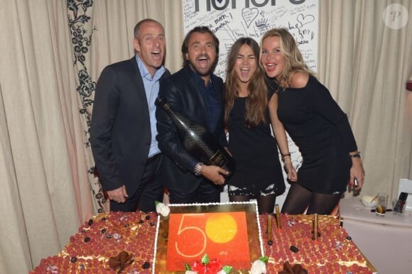 Guy Forget, Henri Leconte, sa fille Luna-Sara et son épouse Florentine lors de la soirée d'anniversaire d'Henri Leconte qui célébrait ses 50 ans au restaurant Très Honoré à Paris le 30 mai 2013