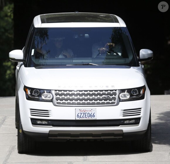 Khloé Kardashian et son mari Lamar Odom arrivent chez Irving Azoff à Beverly Hills pour assister à la baby-shower de Kim Kardashian. Los Angeles, le 2 juin 2013.